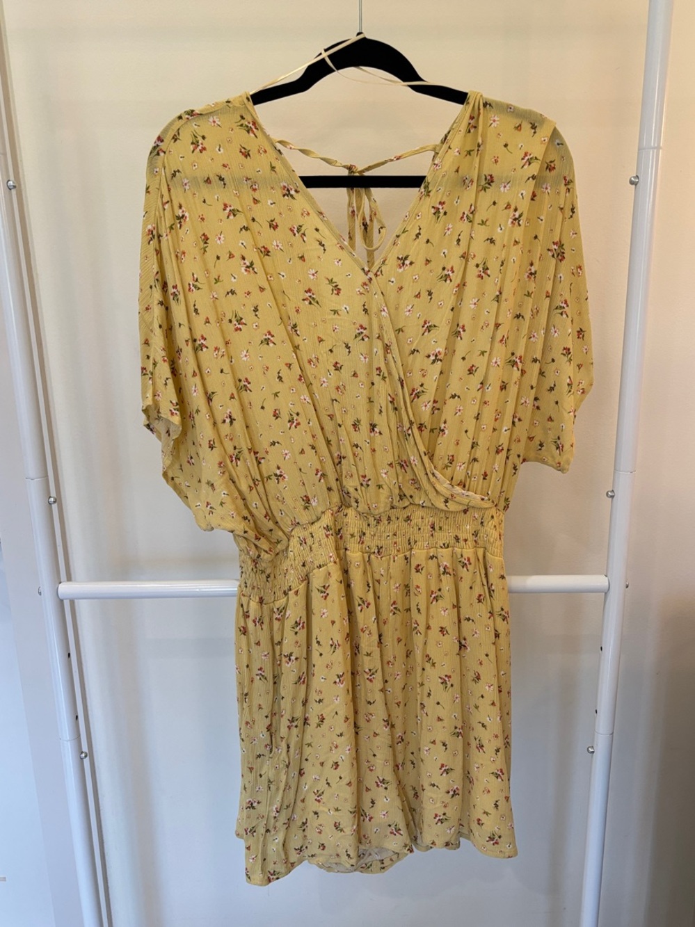 Women’s Yellow Floral V-Neck Smocked Waist Romper with Pockets